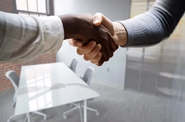 RPO employee and a business owner shaking hands to seal the deal