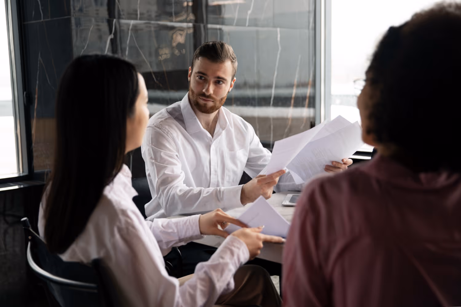 candidates in an office getting ready for an interview at company office