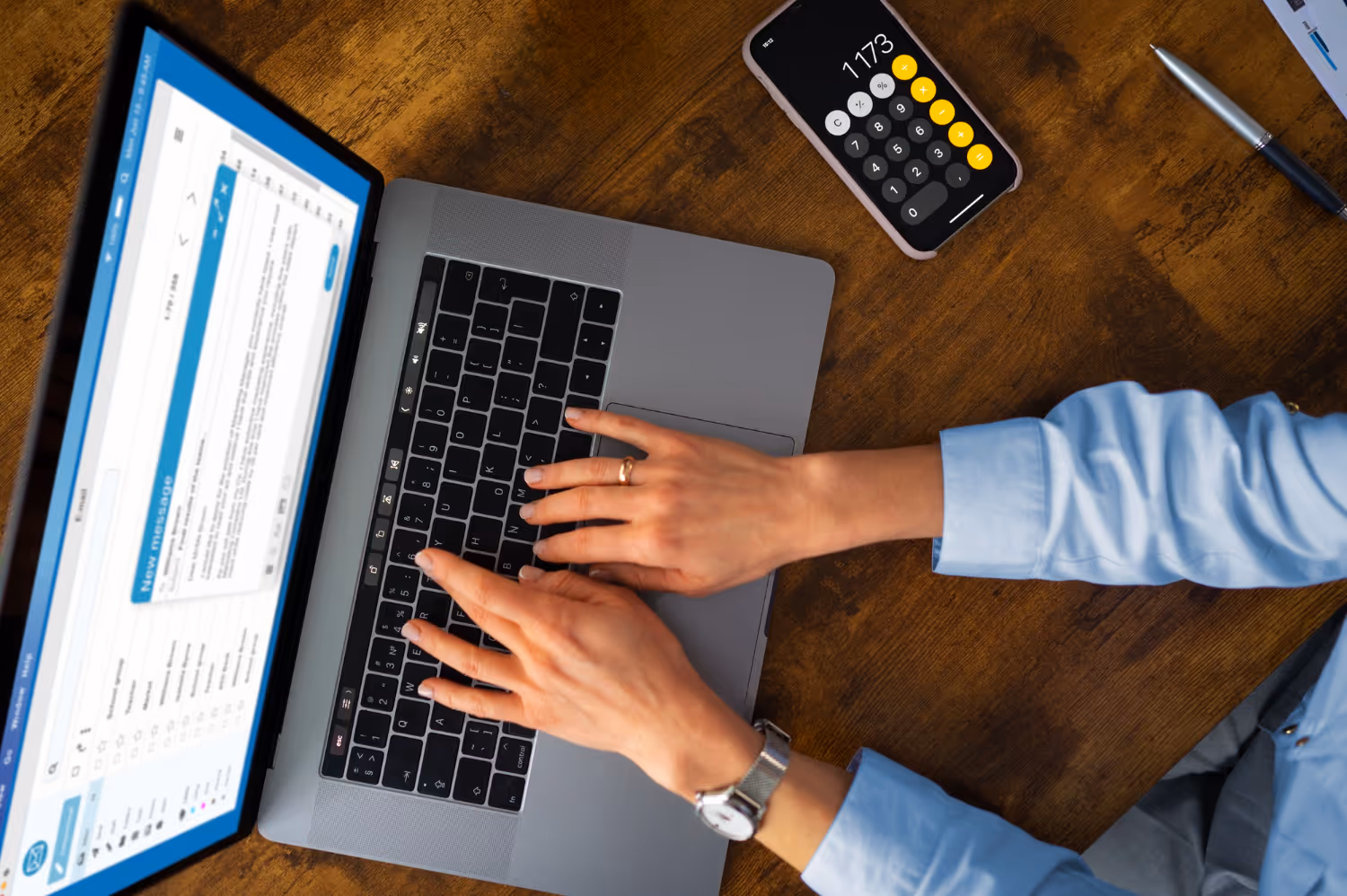 A person typing on a computer