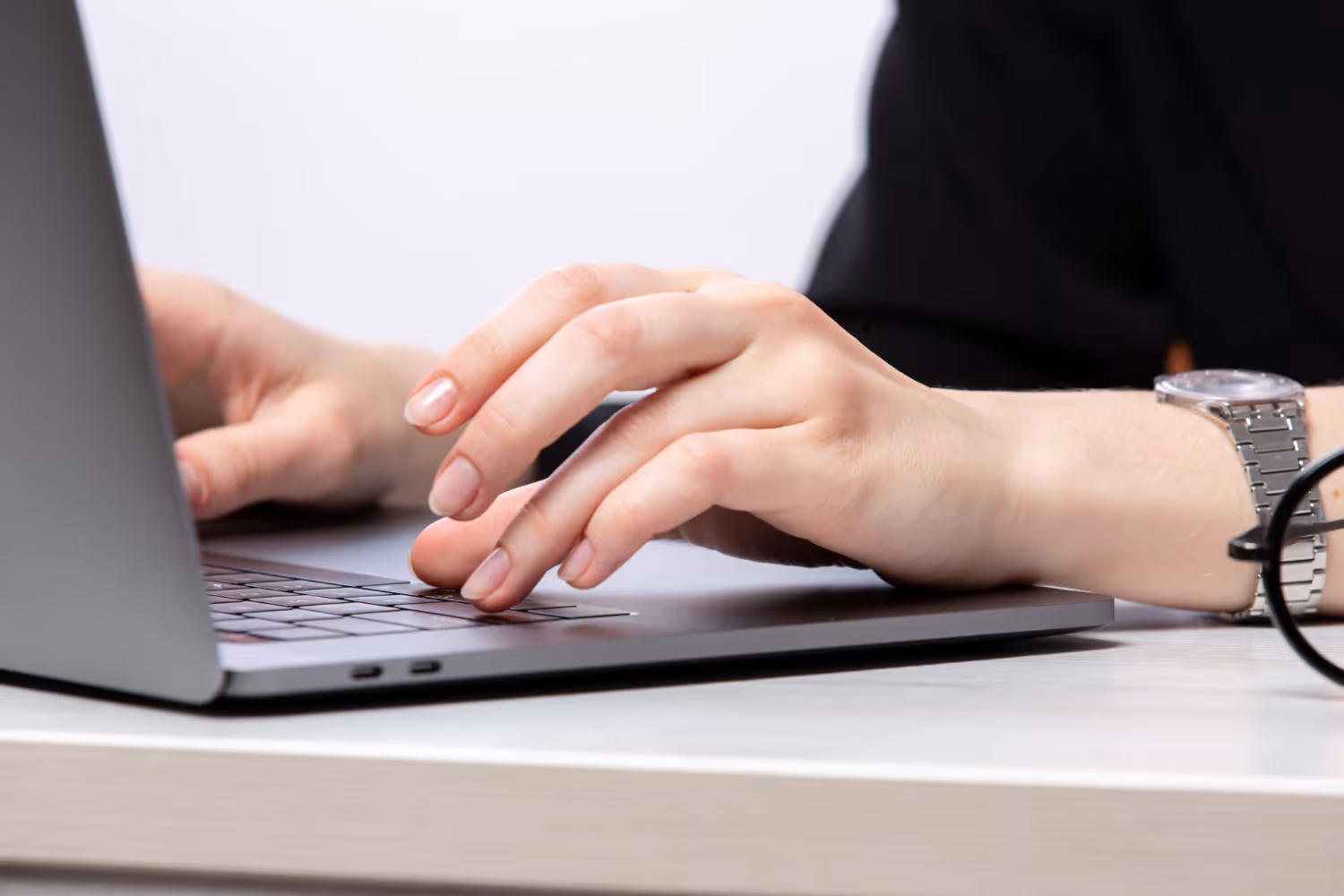 A business owner writing a job description to hire a Hubspot expert