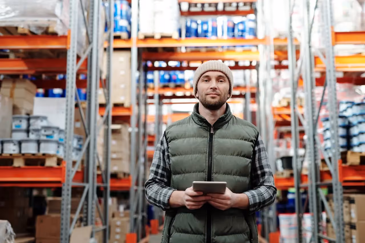 A supply chain employee inside a warehouse