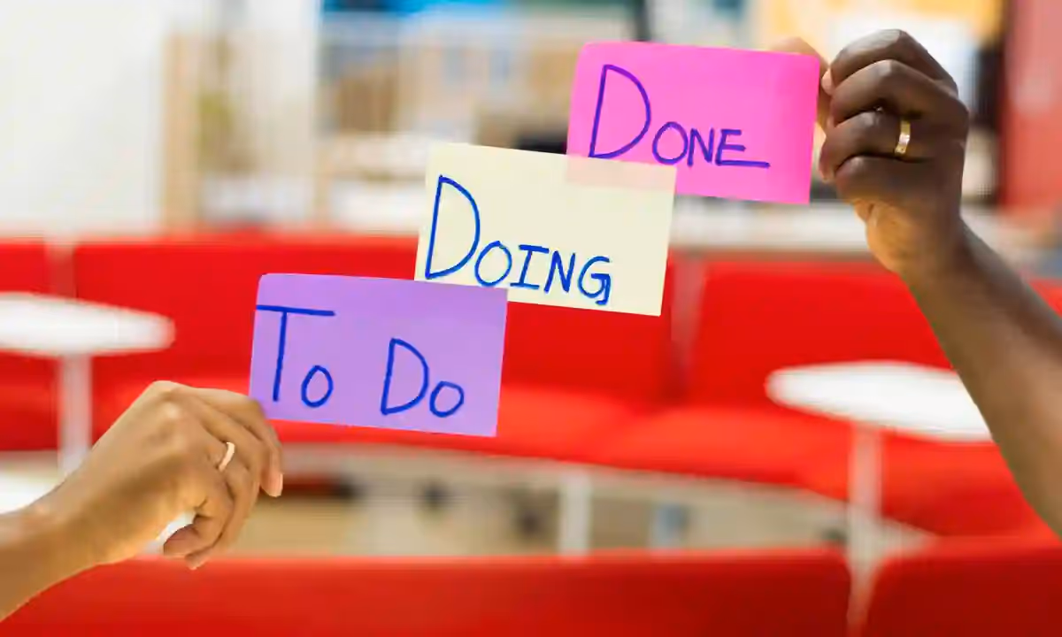 Two hands holding the process of agile nearshore development