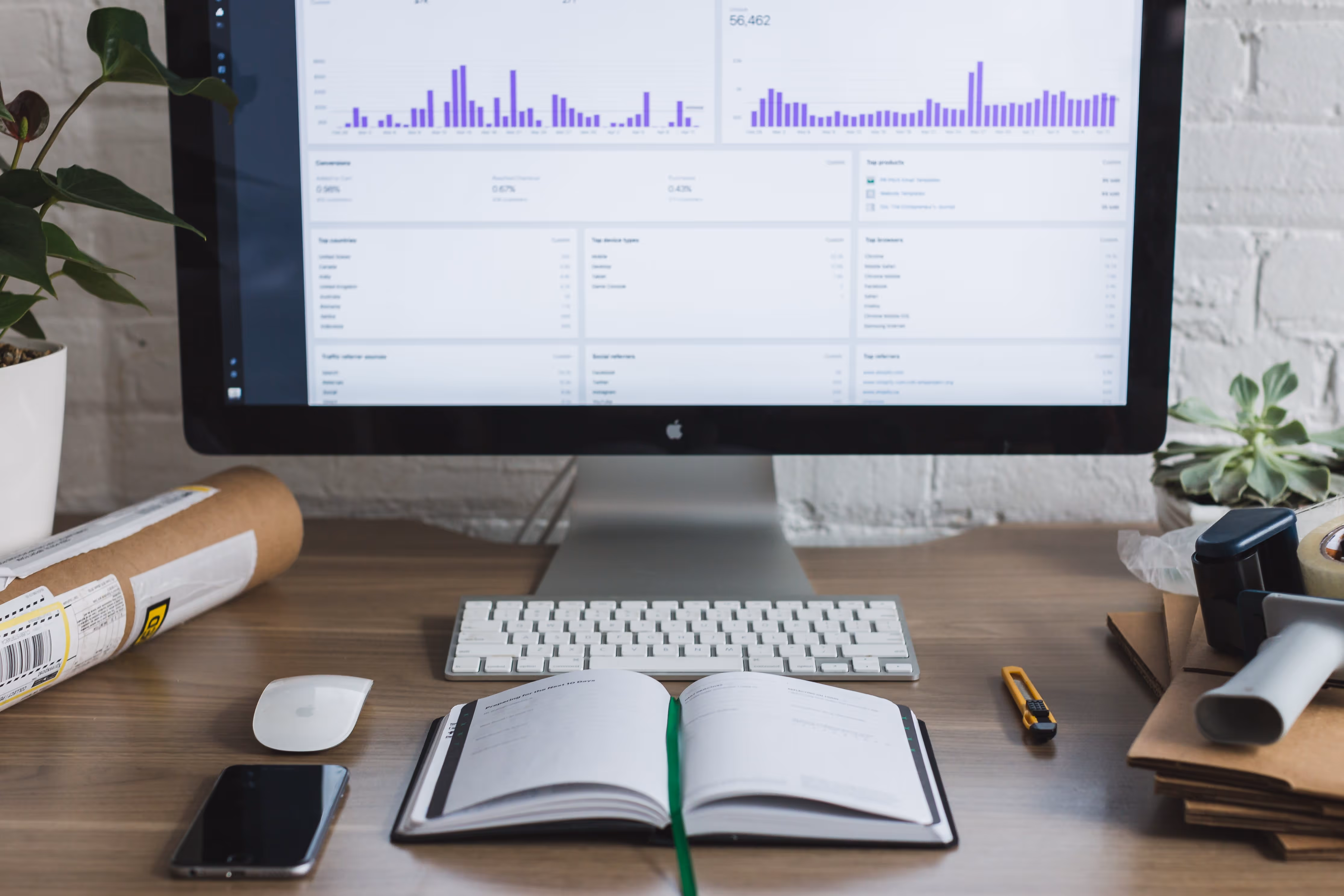 A desktop computer showing a data analyst job description.