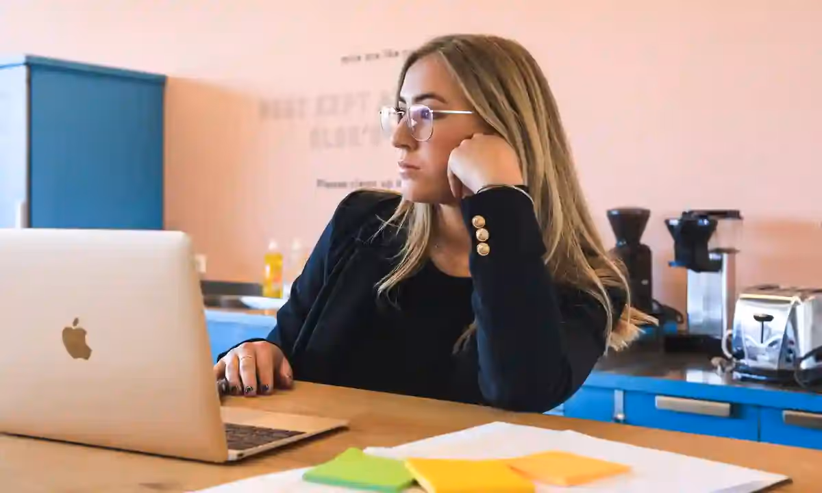 A freelance data engineer working remotely on laptop