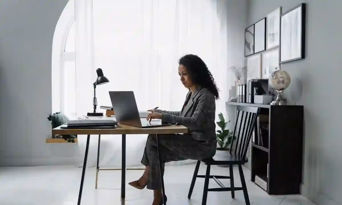 Woman working on her desk.