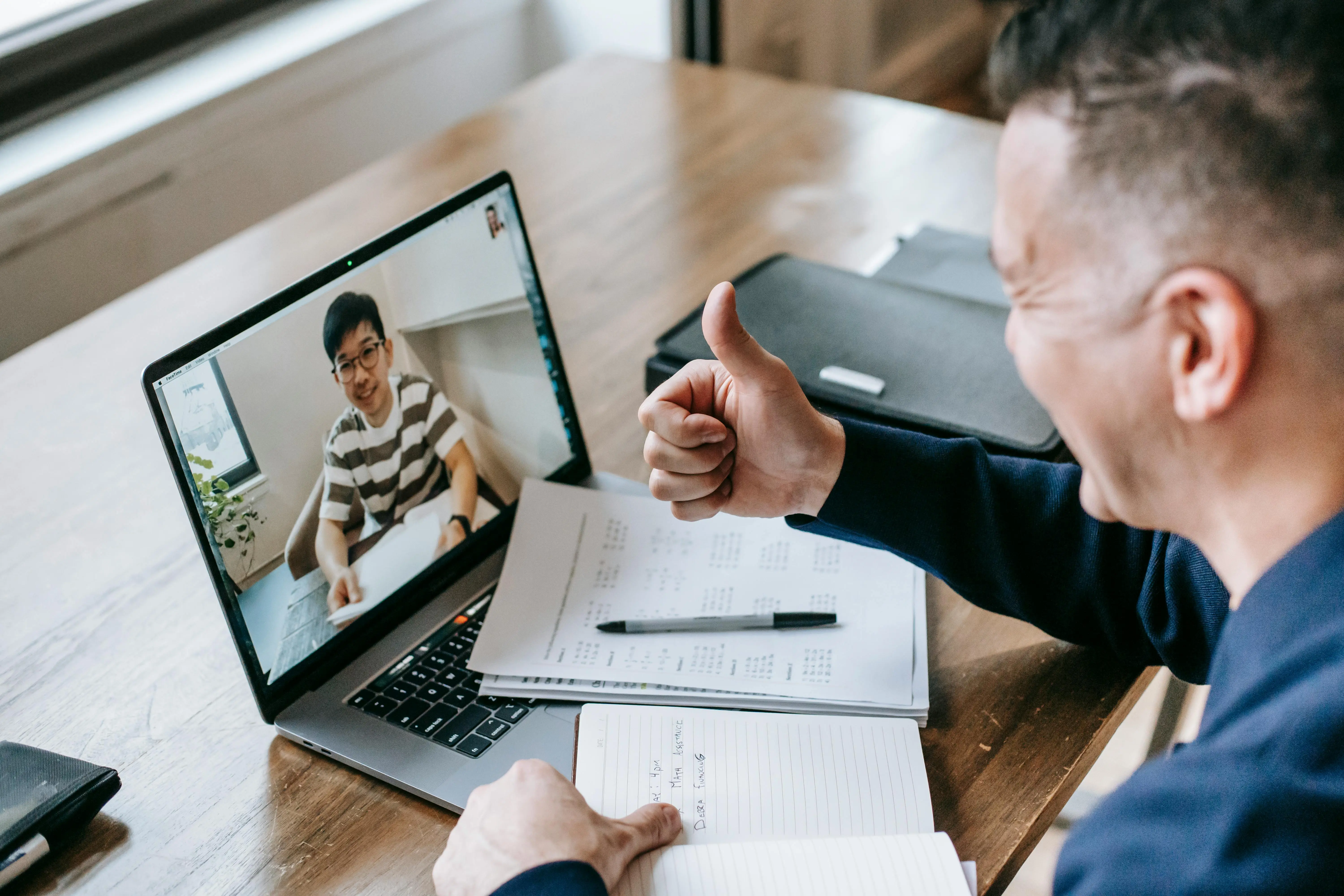 Workers having a videocall.