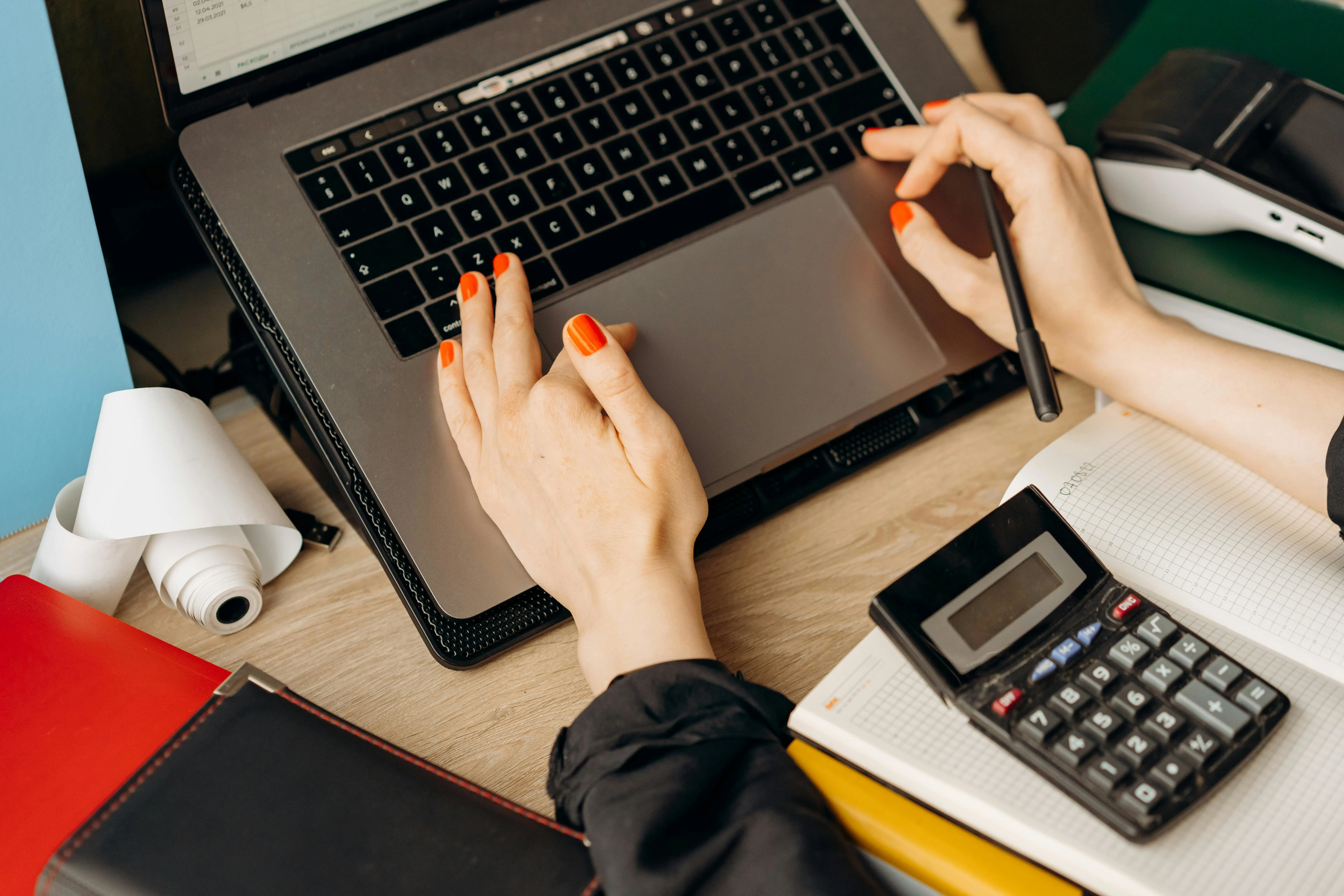 Bookkeeper working on a computer.