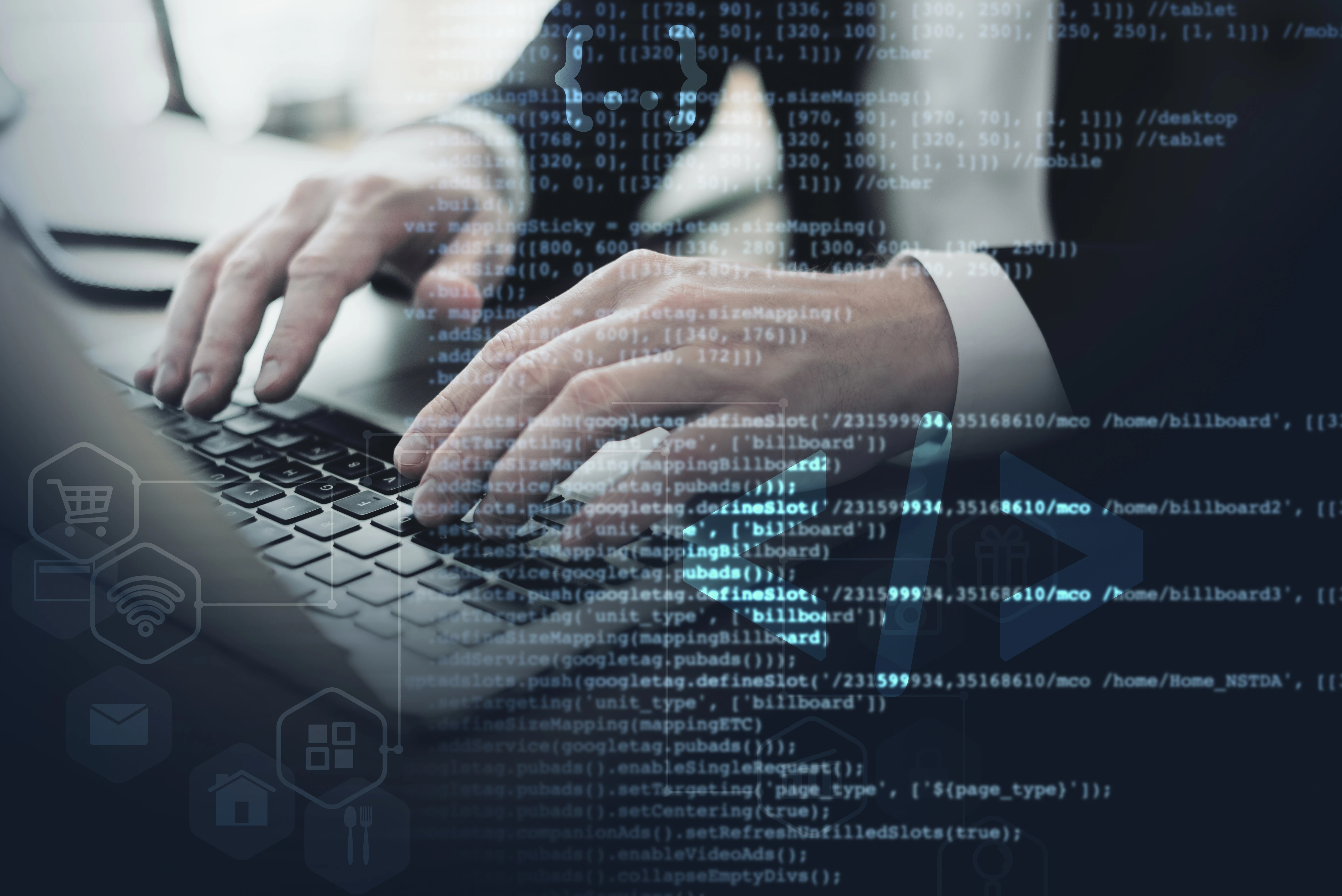 html-css code with hands on a keyboard in the background.
