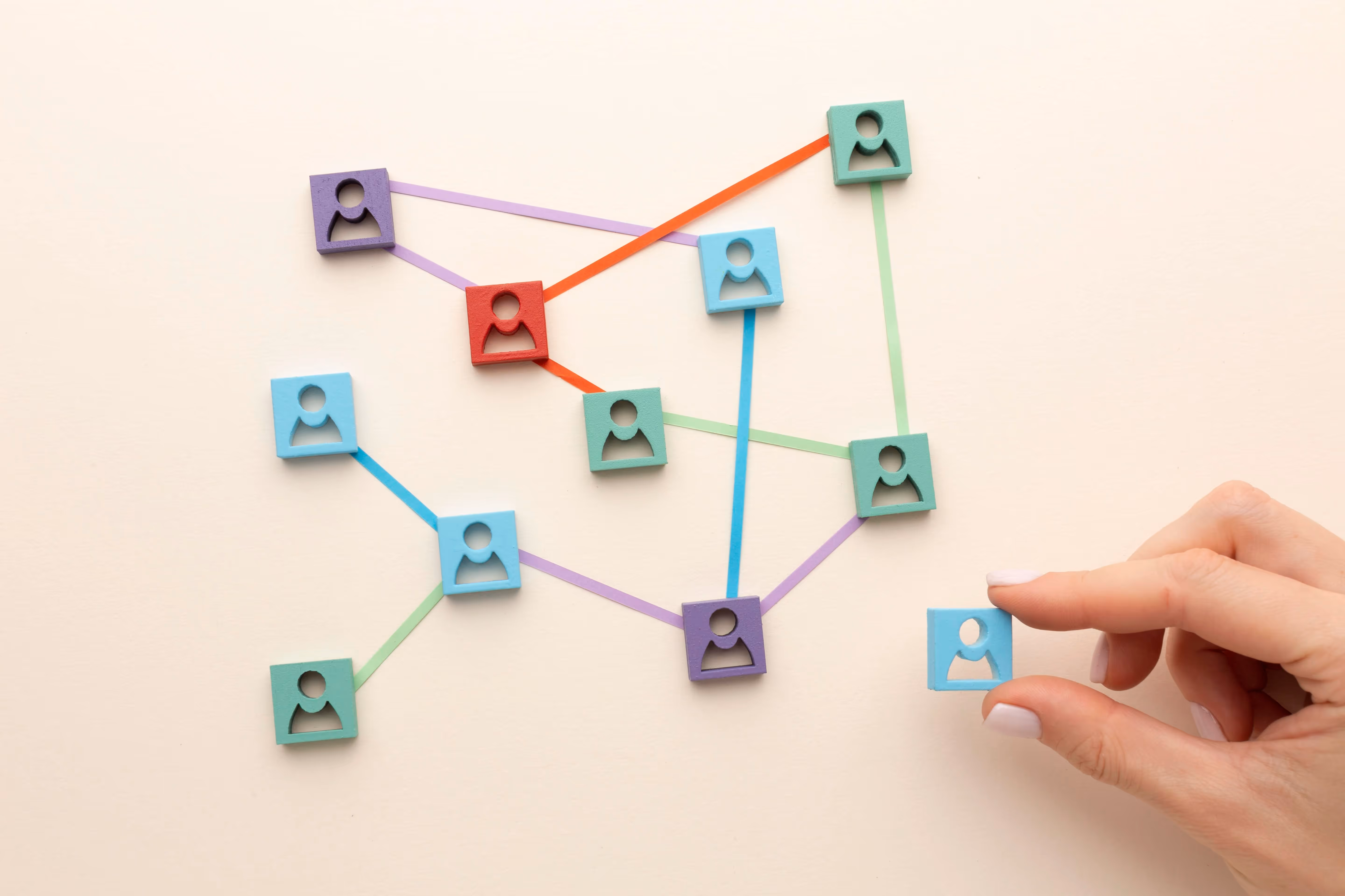 Networking represented with figures and paper.