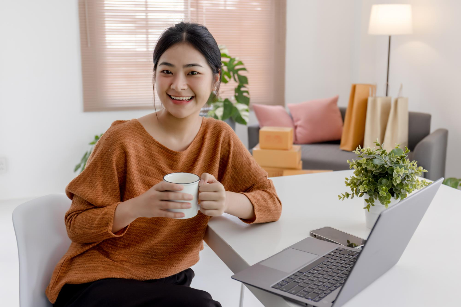 employee smiling, working from home
