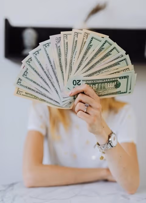 Woman holding her salary