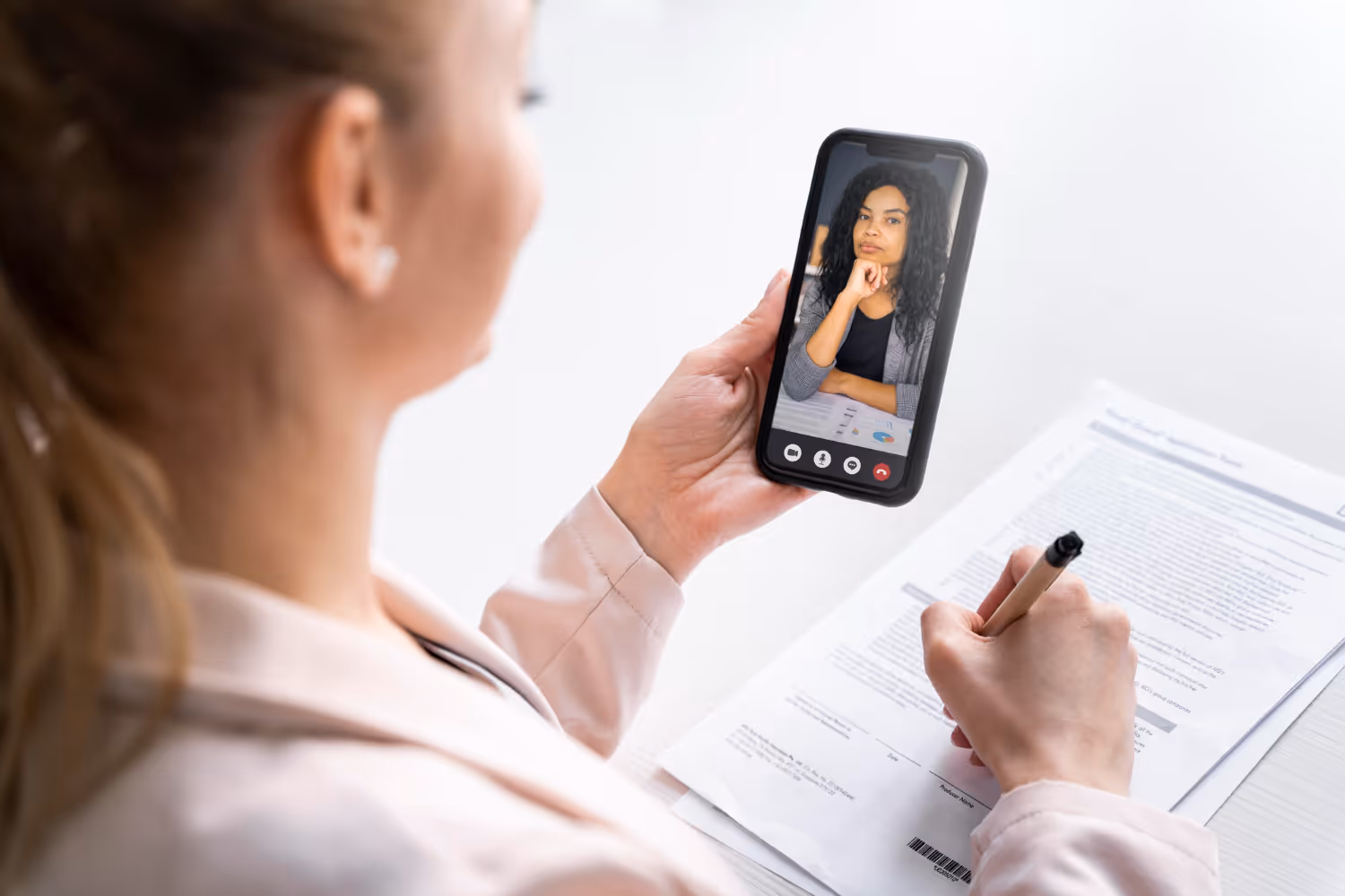 Employer interviewing a candidate on the phone