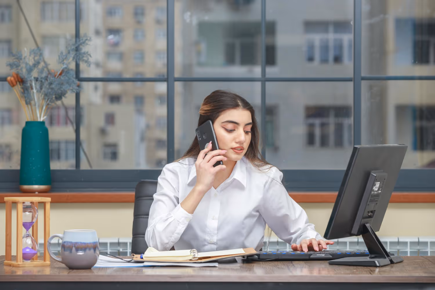 Woman talking on the phone with potential candidate