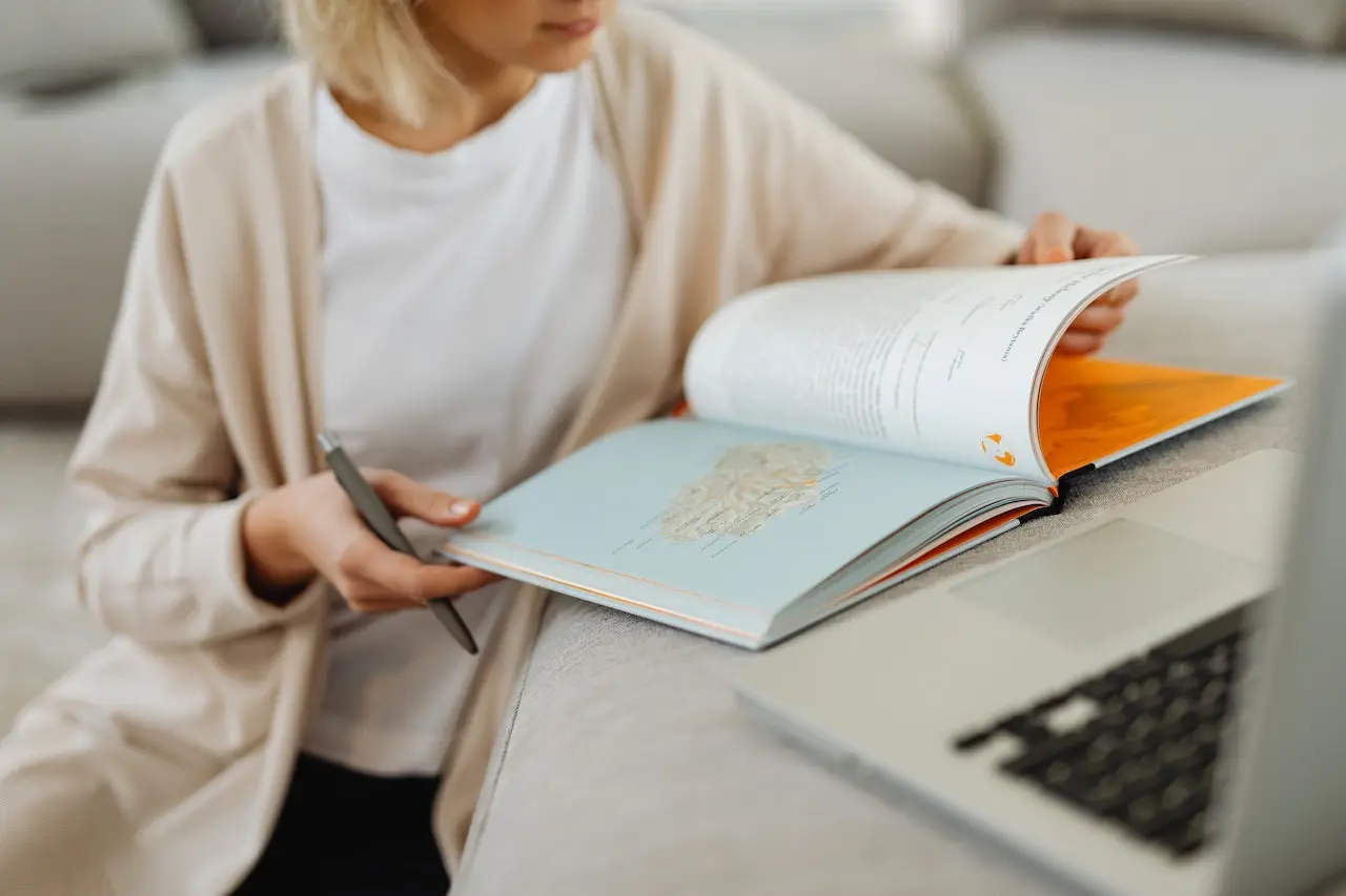 remote worker taking a break to read a book