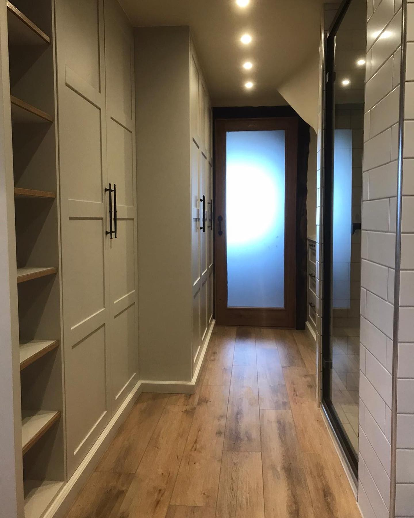 Dressing room with white wardrobes