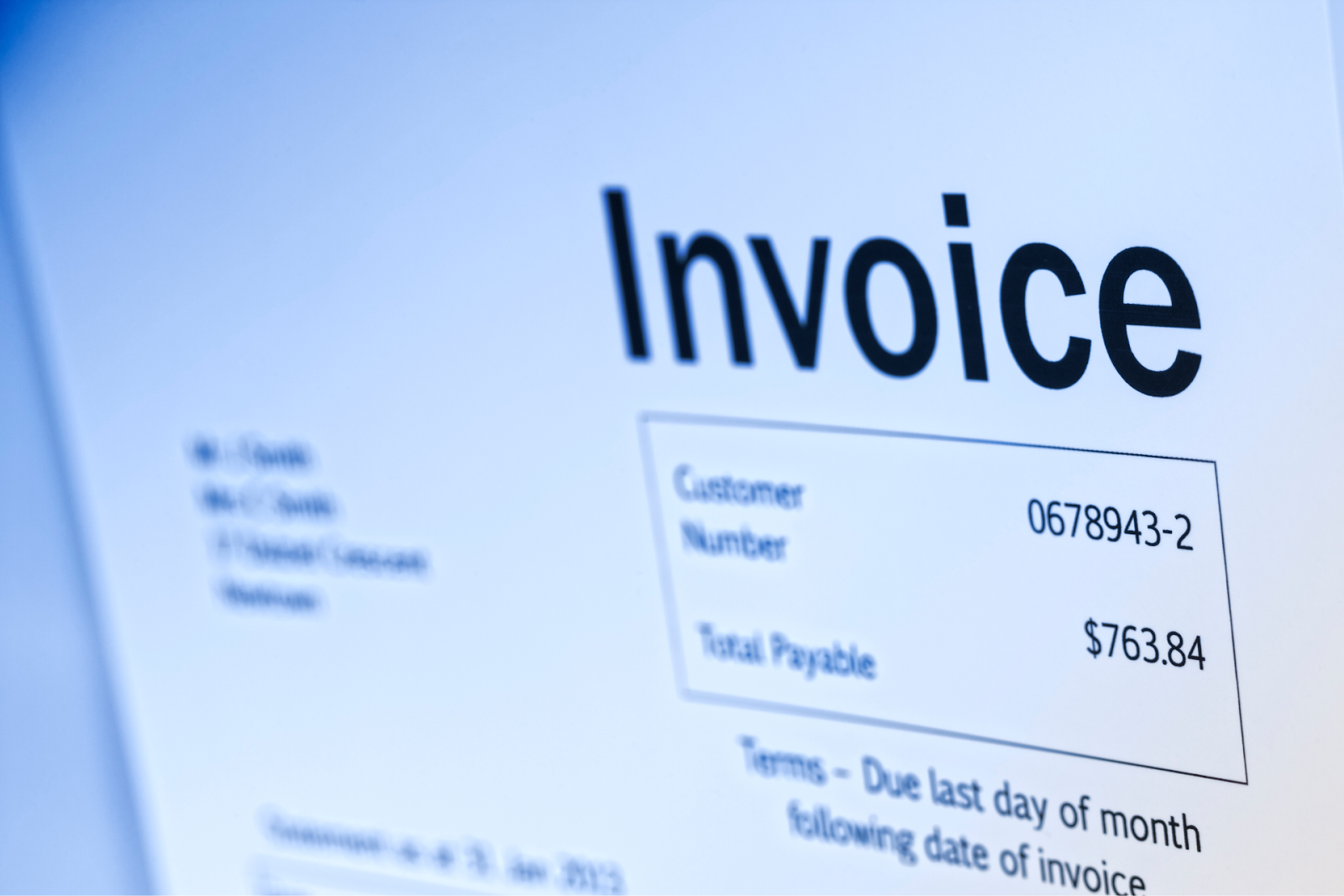 A close-up shot of an invoice