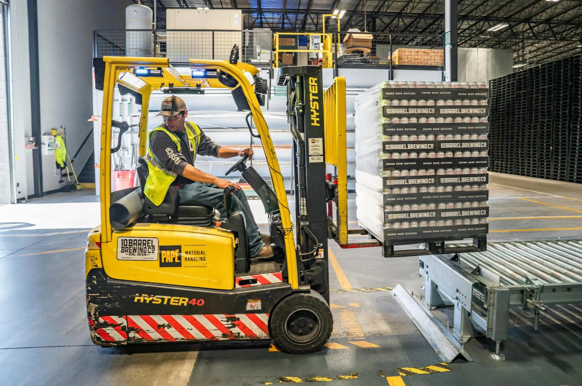Forklift operator representing small businesses with operational funding needs.