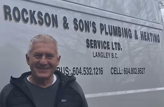 Sam Rockson, from Rockson and sons in front of service van.