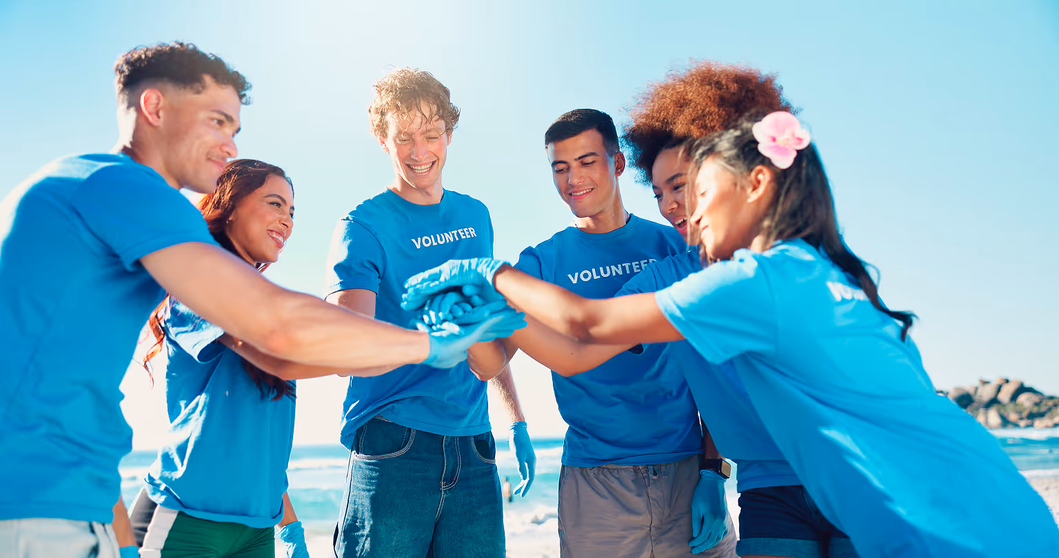 A group of young volunteers cheering each others up