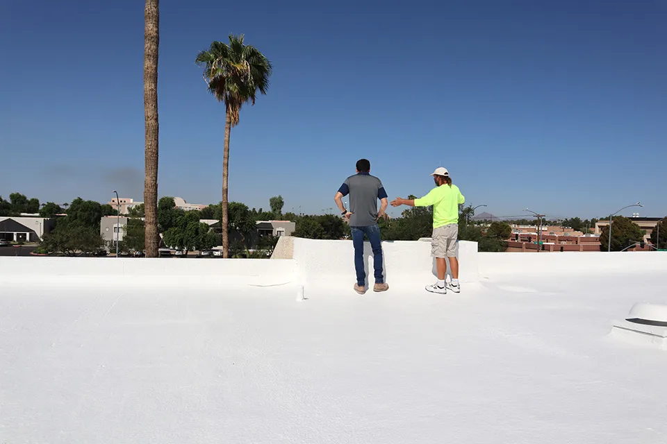contractors inspecting roof