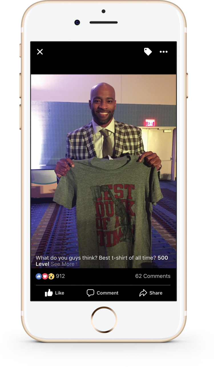 Vince Carter holding his 500 Level shirt on Instagram