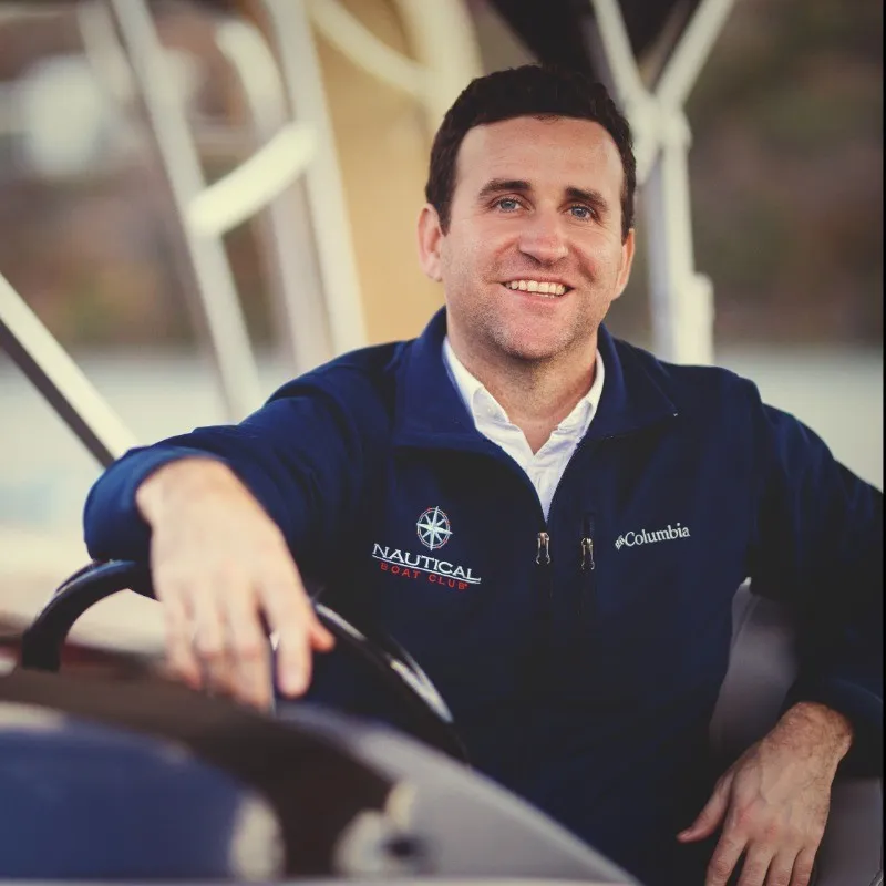 Bryan Wallace, Nautical Boat Club, at the helm of a boat