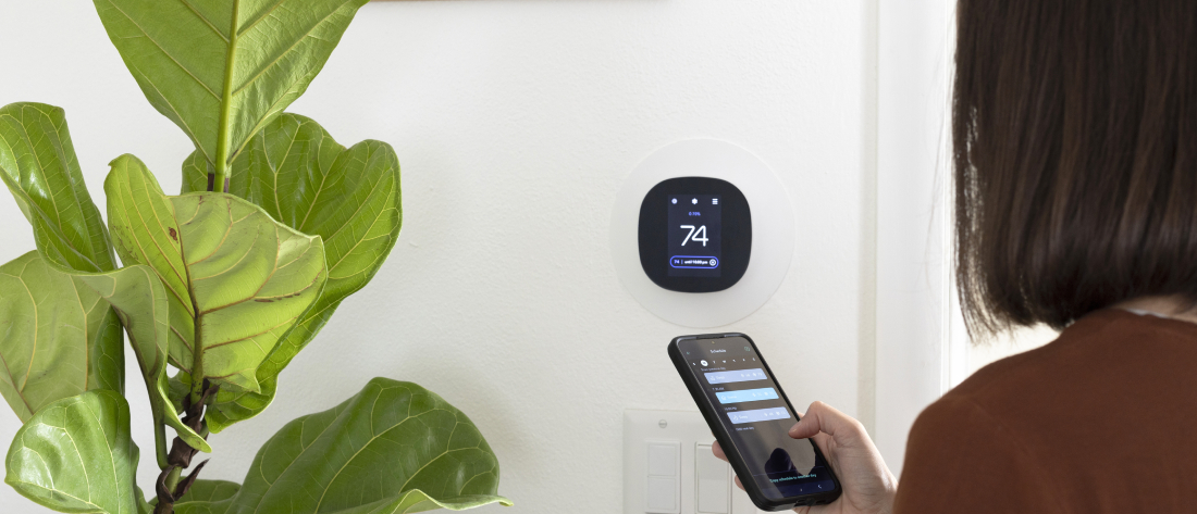 Modern UK home with energy-efficient heating features including underfloor heating, smart thermostat and well-insulated interior.