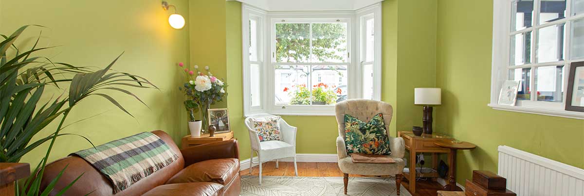 Renovated Victorian home interior with restored period features and modern finishes in the UK