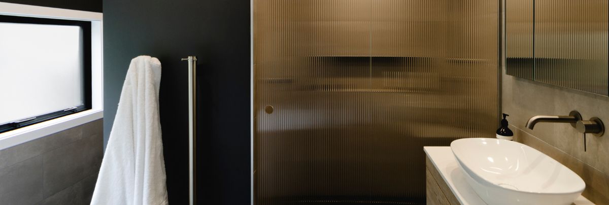 Striking Ensuite Renovation with Fluted Glass in Seatoun