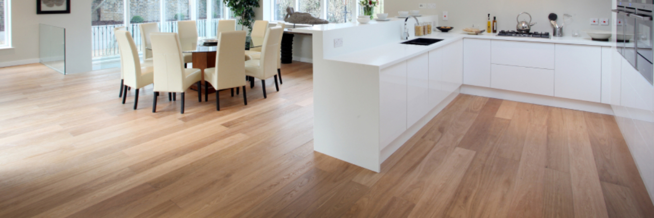 Modern New Zealand home interior showing different flooring types in open-plan living space