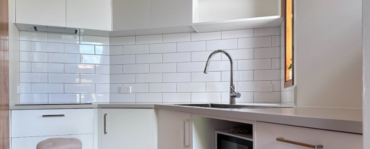 Compact townhouse kitchen update in Queenstown