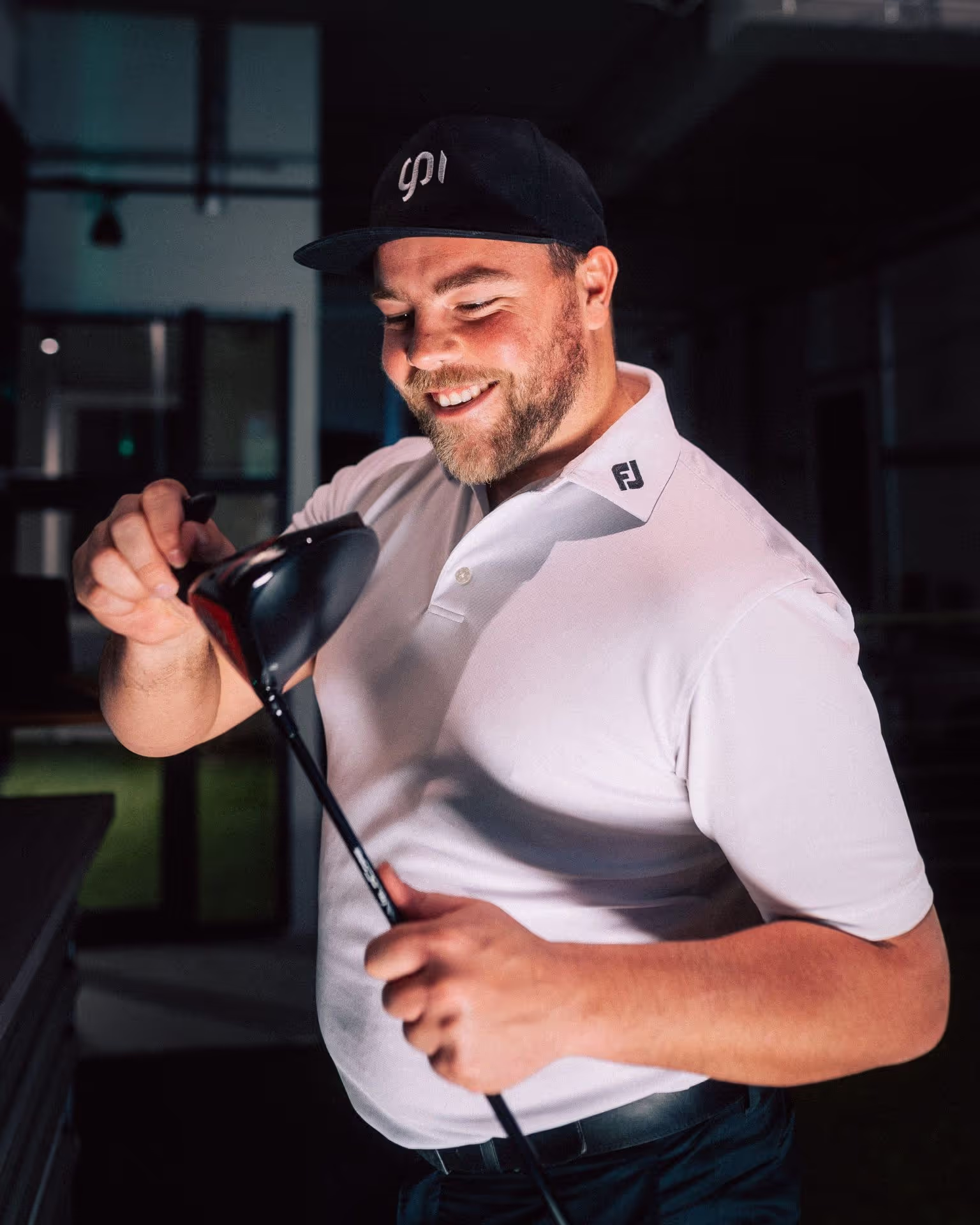 Martin smiling during a Golf Fitting in Berlin. Golfschläger Fitting at GPI