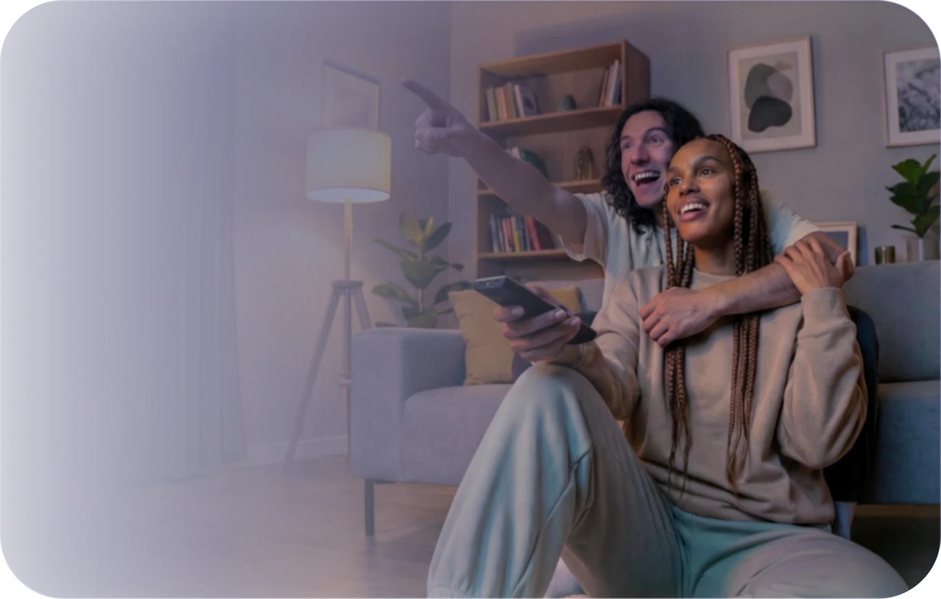 2 devices of different sizes with a play button