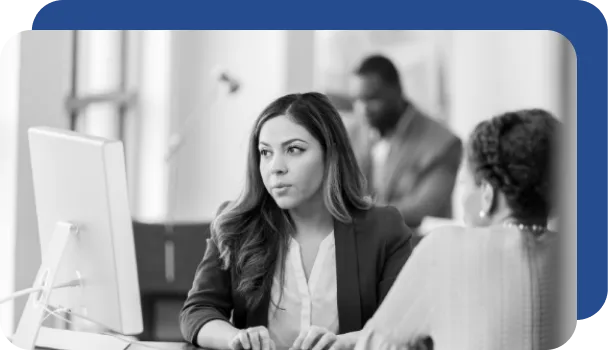 A financial advisor works with a client to discuss financial risk management.