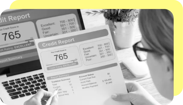 A financial manager reviews an applicant's credit history as part of financial risk management procedures.