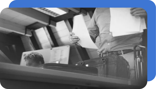 A person handles documents that could be automated with document automation.