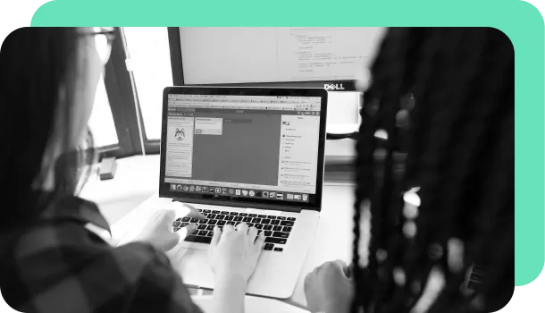 A person uses automation tools to create and manage documents.