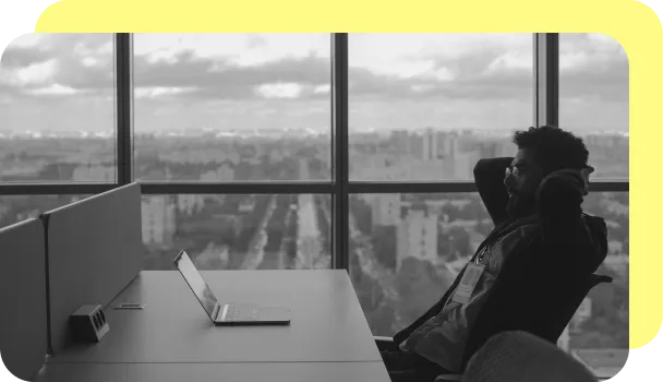 person sits in front of a computer hoping to detect fraud.
