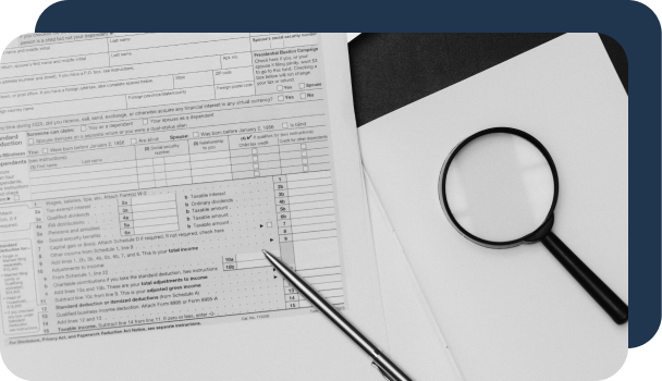 Magnifying glasses sit next to documents as if being used to detect fraud without AI.