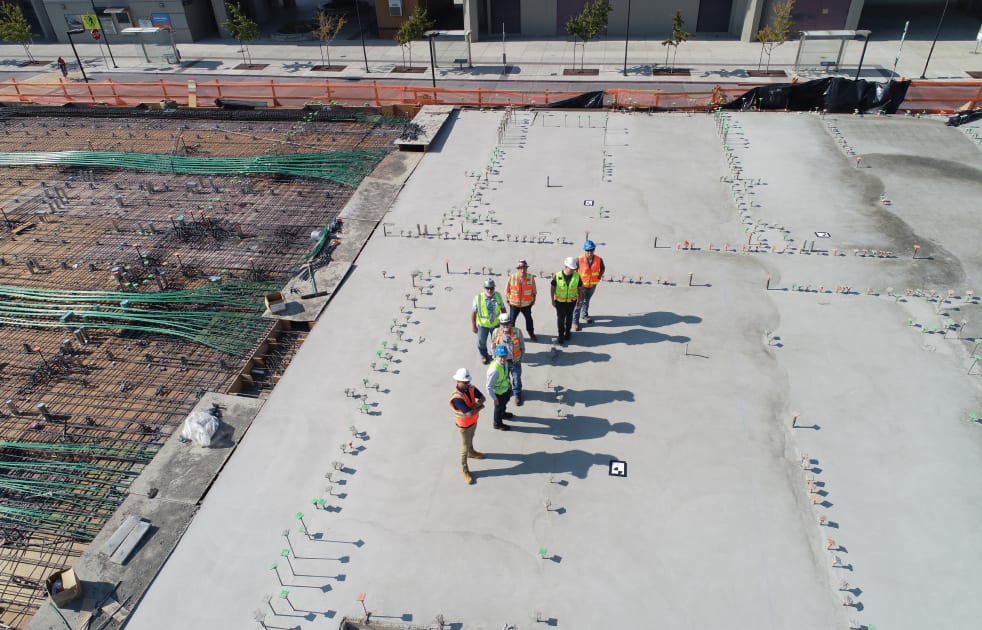 Overview of crew standing on construction project