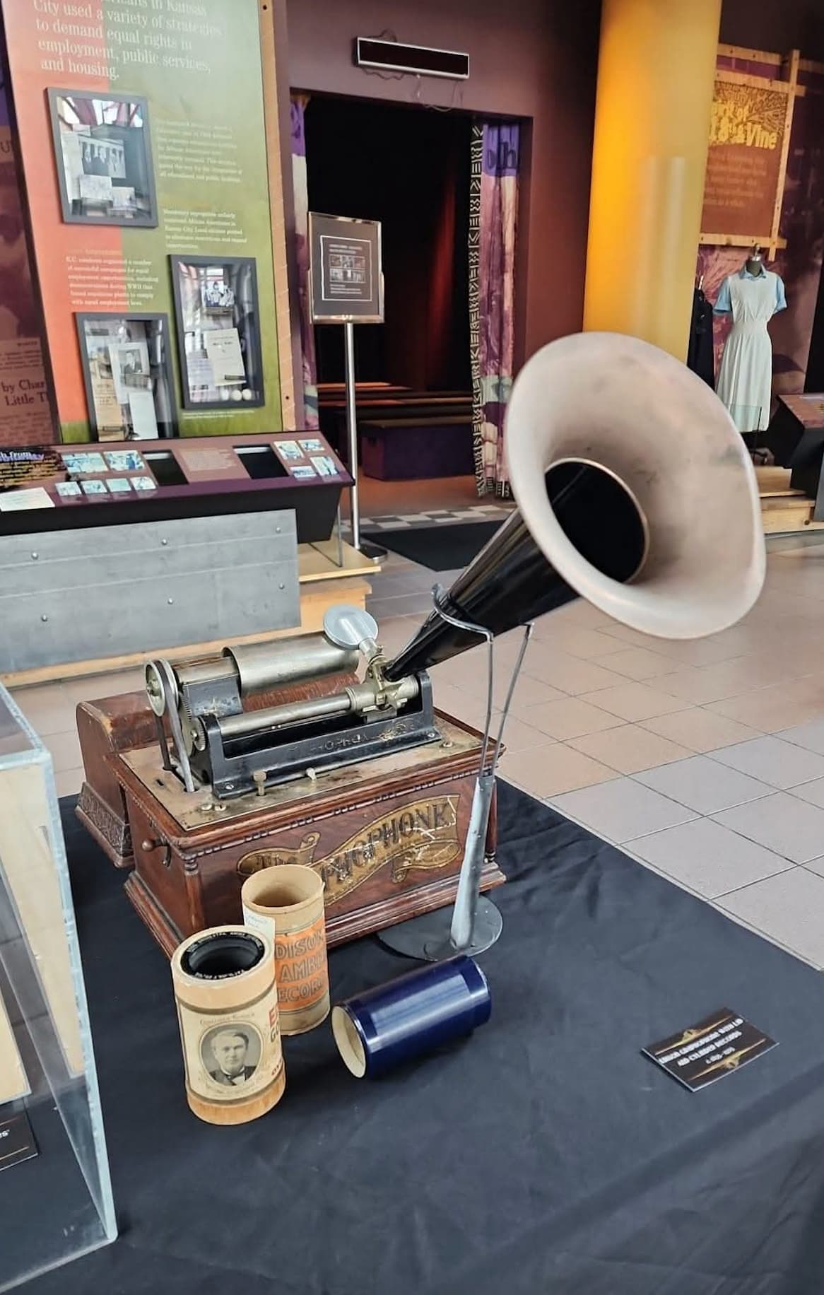 Antique Edison phonograph and wax cylinder records on display at the American Jazz Museum, highlighting early sound recording technology.