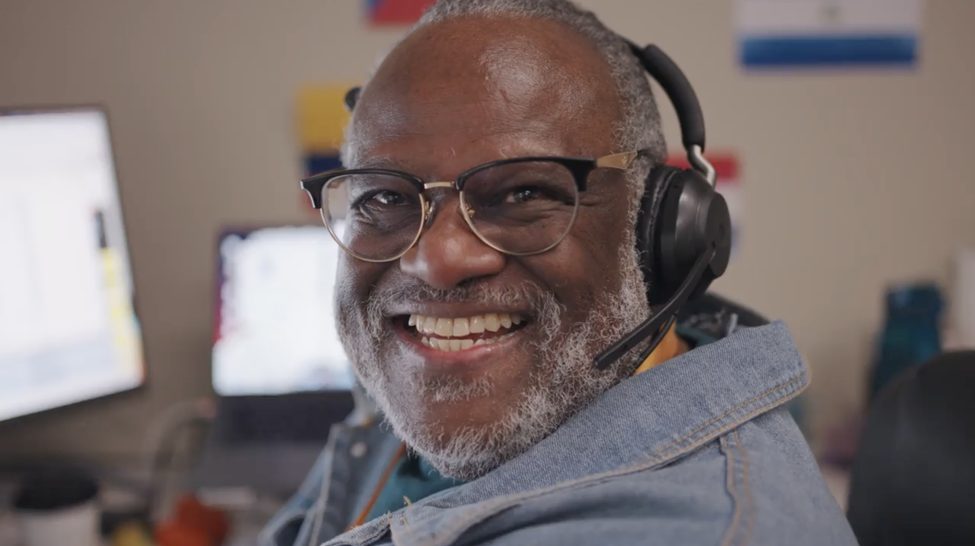 A Journey Mental Health Center crisis-line specialist smiling at work