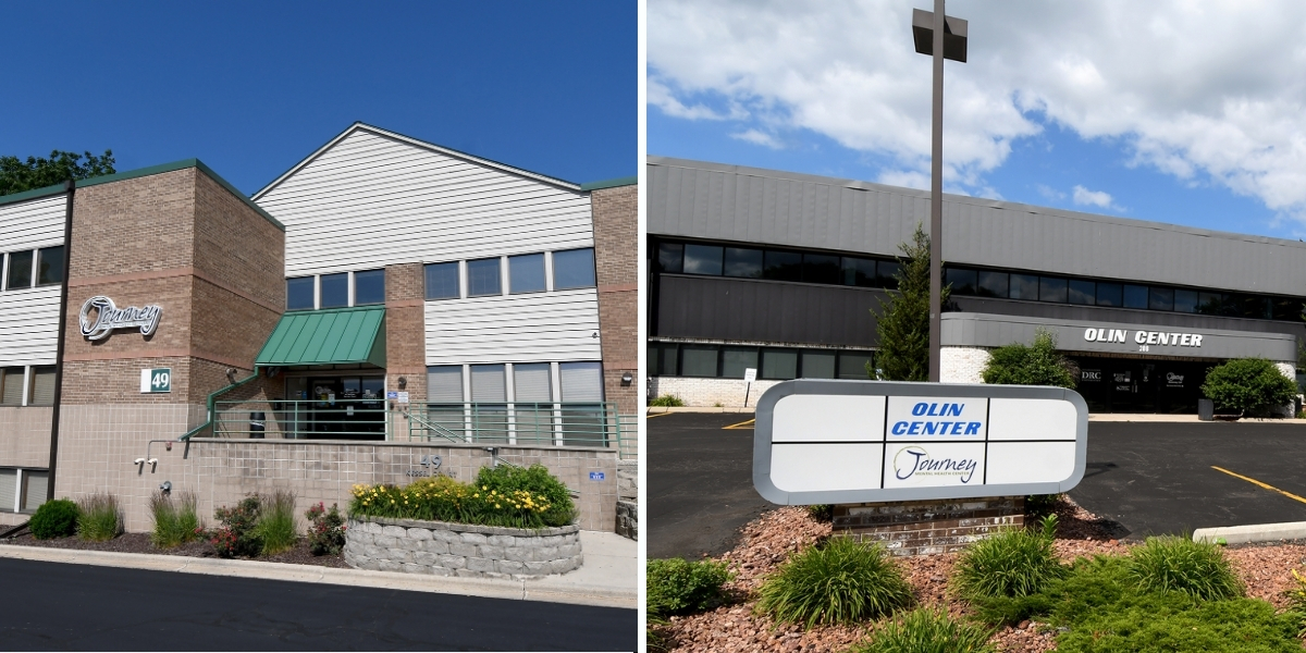 brick building on journey campus numbered 49 and grey business park building labeled Olin Center with sign out front 