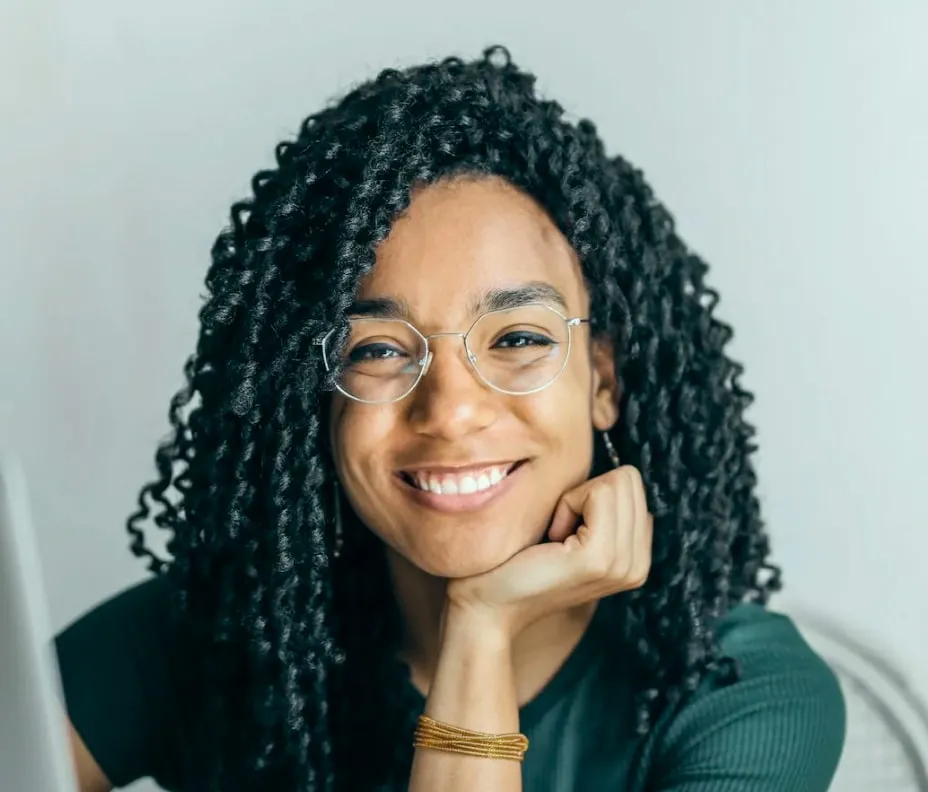 A member of the Inflow team smiles at a coworker.