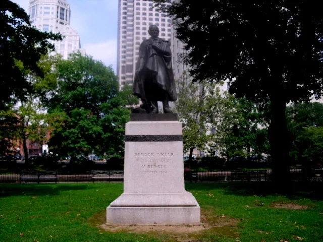 The bronze statue of Horace Wells on its granite pedestal in Bushnell Park