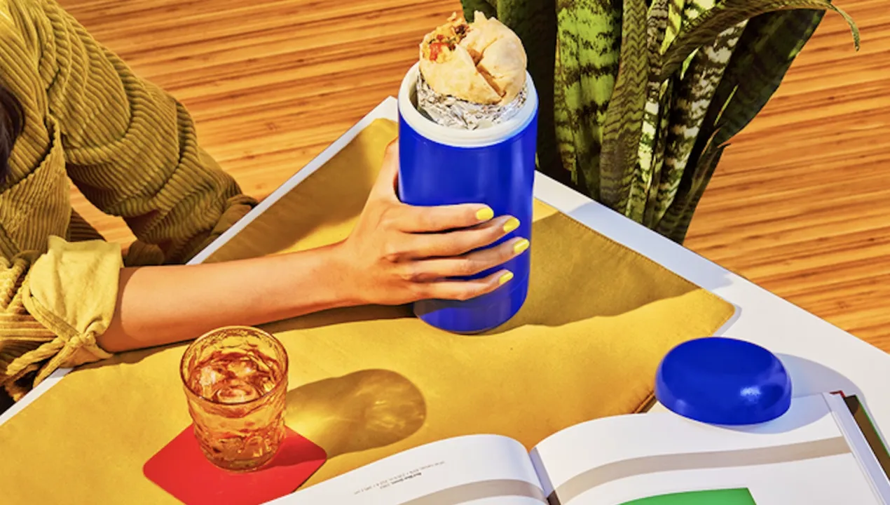 someone holding a burrito pop product