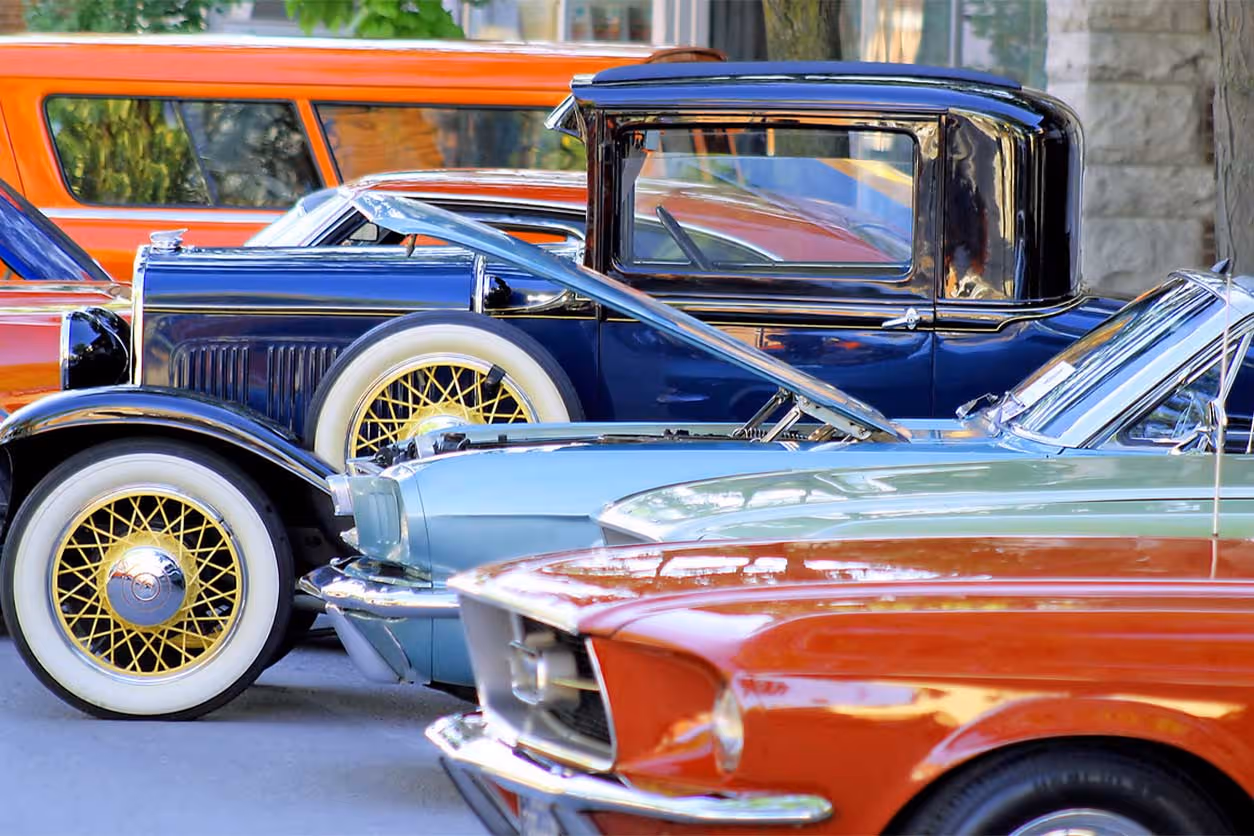 classic autos lined up - Antique Auto Insurance concept