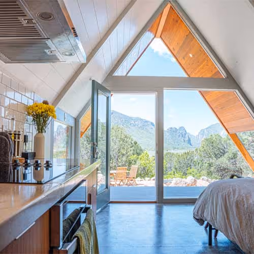 interior of nice home looking out trhough windows - AirBnB Insurance concept