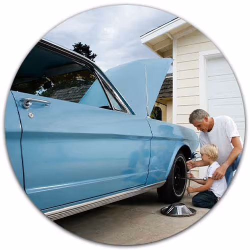 man washing classic car - Collector Car Insurance concept