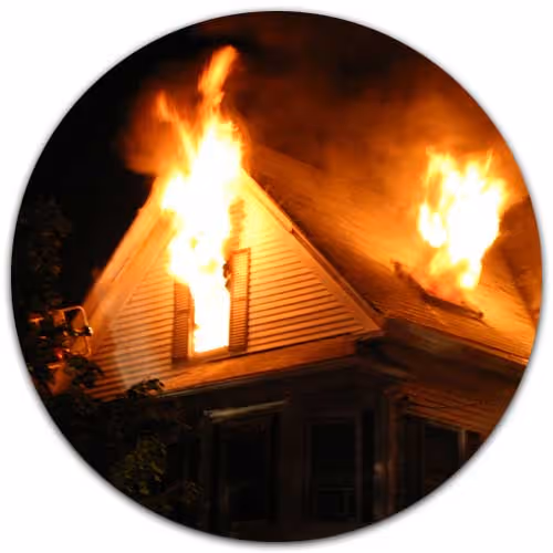 exterior shot of home on fire - Dwelling Fire Insurance concept